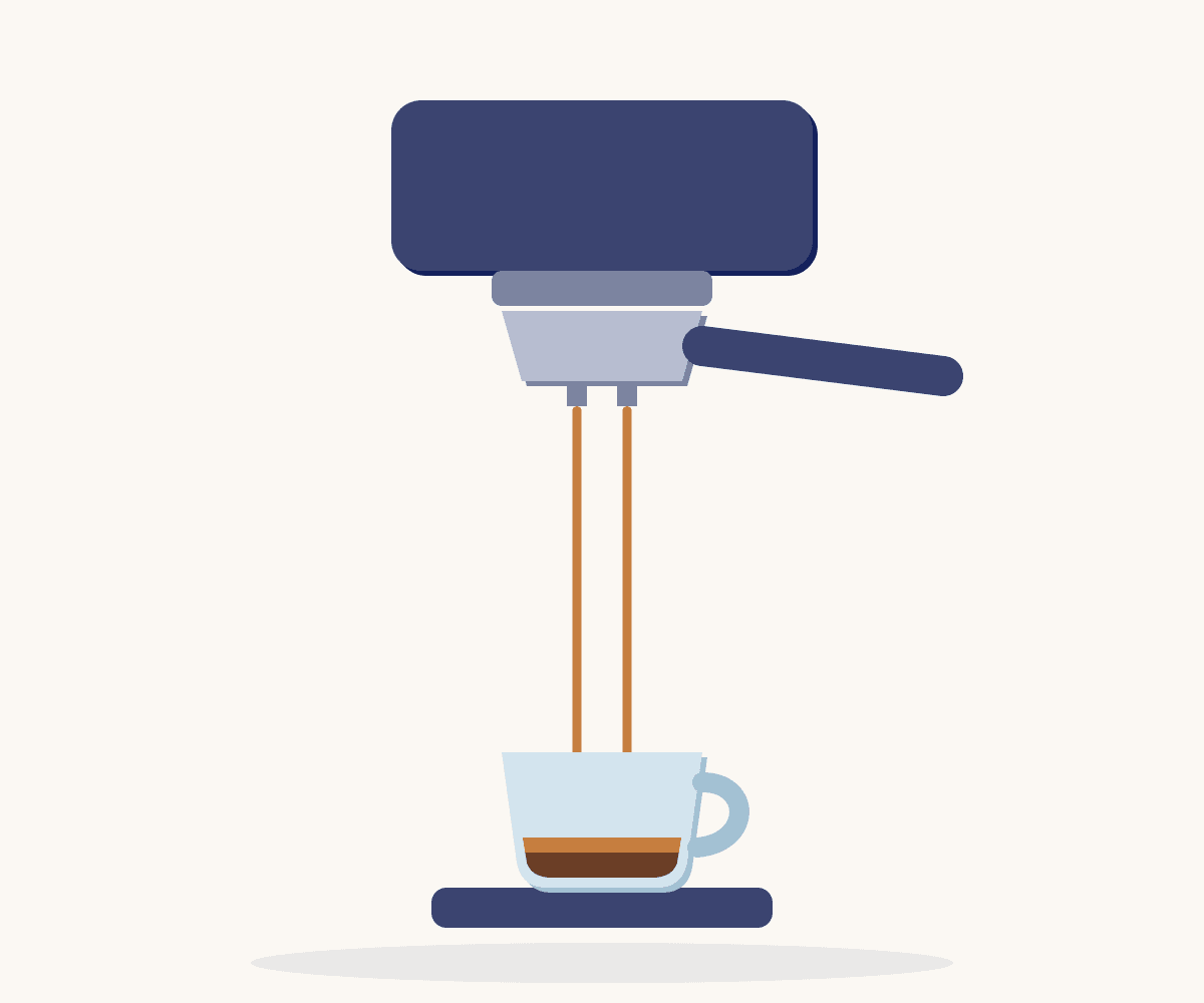 Espresso makinesinden fincana iki ince akışla espresso akıyor